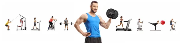 Muscular guy lifting weights and many people exercising in the b — Φωτογραφία Αρχείου