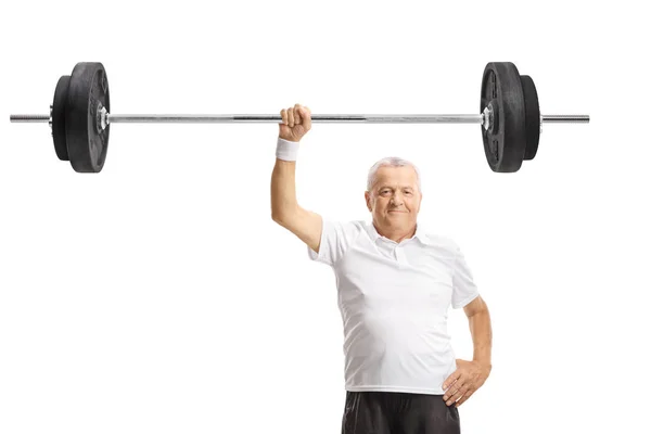 Strong mature man lifting a barbell with one hand — Stock Photo, Image