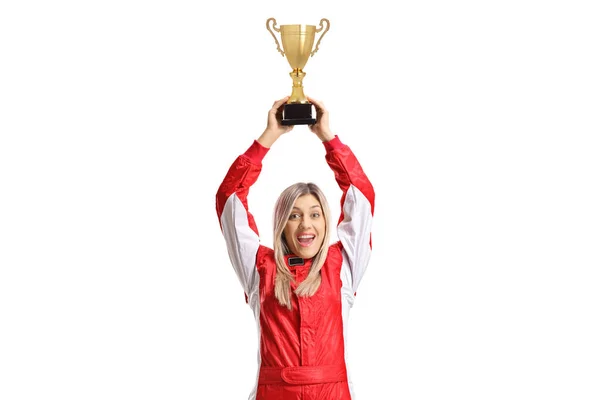 Happy female racer holding a golden trophy cup — Stock Photo, Image