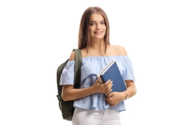 Mooie studente met rugzak en boeken — Stockfoto