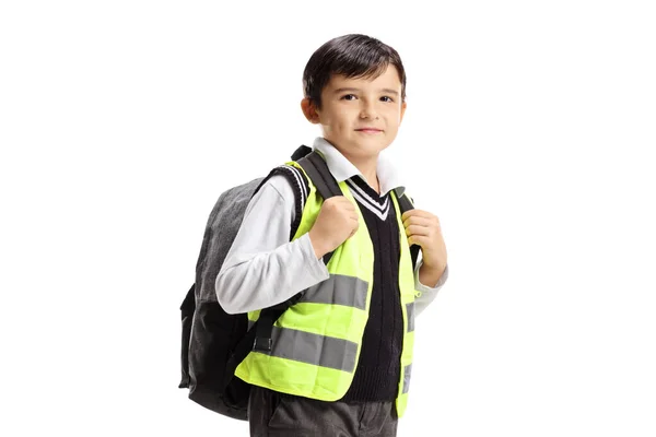 Menino com mochila e colete de segurança — Fotografia de Stock