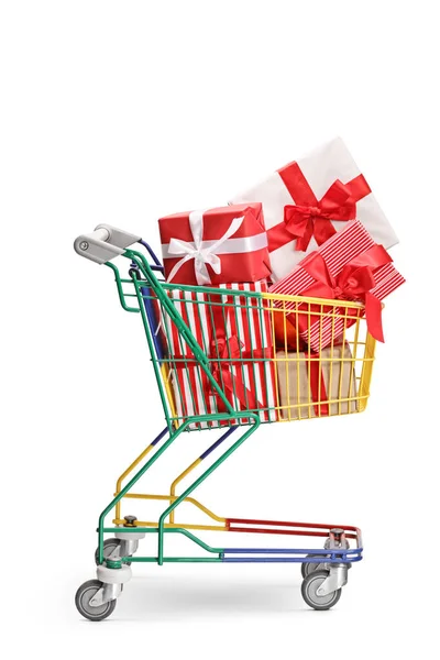 Mini carrito de compras lleno de regalos envueltos — Foto de Stock