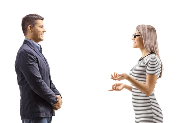 Man and woman standing and having a conversation — Stock Photo, Image