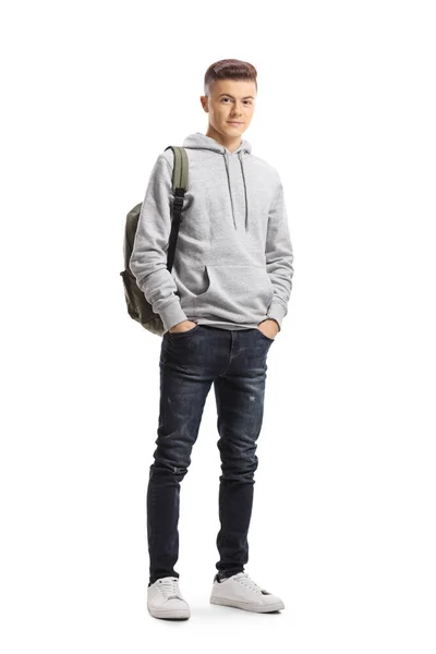 Teenage schoolboy posing with hands in pockets — Stock Photo, Image