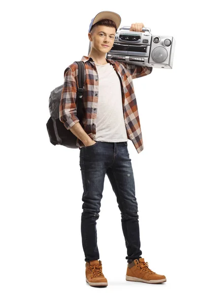 En mannlig tenåringsstudent med en boombox på skulderen – stockfoto