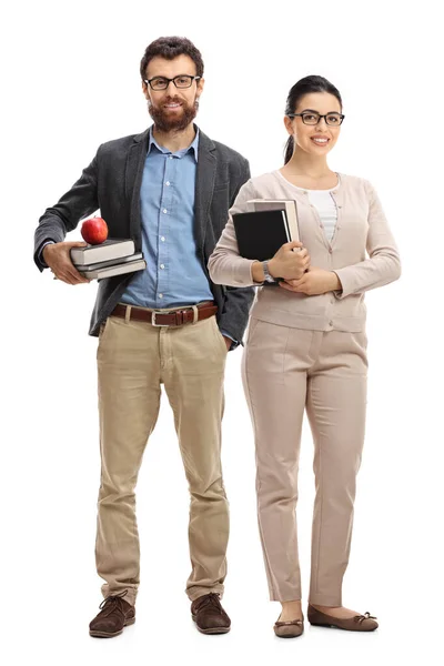 Guru laki-laki dan perempuan berdiri dan memegang buku — Stok Foto