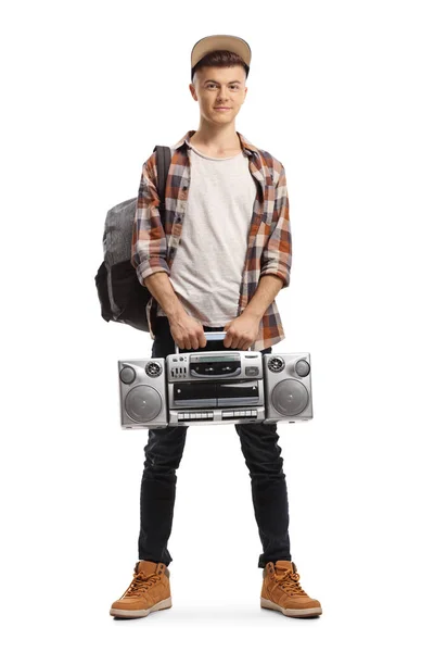 Adolescente masculino segurando um rádio boombox — Fotografia de Stock