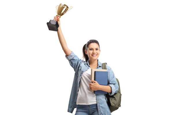 Šťastná studentka držící zlatou trofej — Stock fotografie