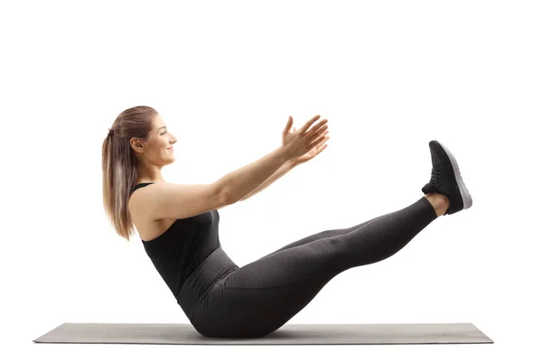 Young Woman Sportswear Sitting Floor Stretching Legs Isolated White — Stock Photo, Image