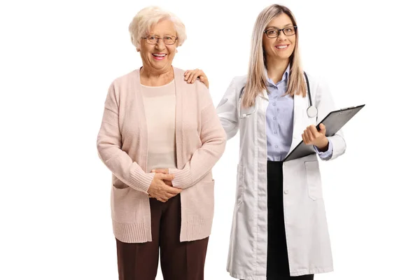 Female Doctor Holding Elderly Woman Shoulder Isolated White Background — Stock Photo, Image