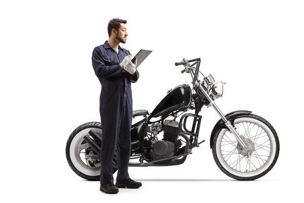 Motorbike Mechanic Writing Document Looking Chopper Isolated White Background — Stock Photo, Image