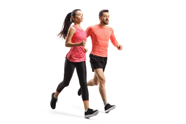 Beyaz Arka Planda Kadın Erkeğin Spor Kıyafetleri Içinde Birlikte Koşarken — Stok fotoğraf
