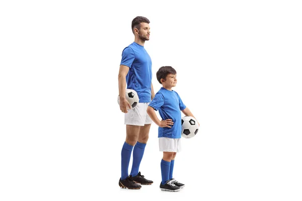 Volledige Opname Van Een Volwassene Kind Voetballers Identieke Outfit Geïsoleerd — Stockfoto