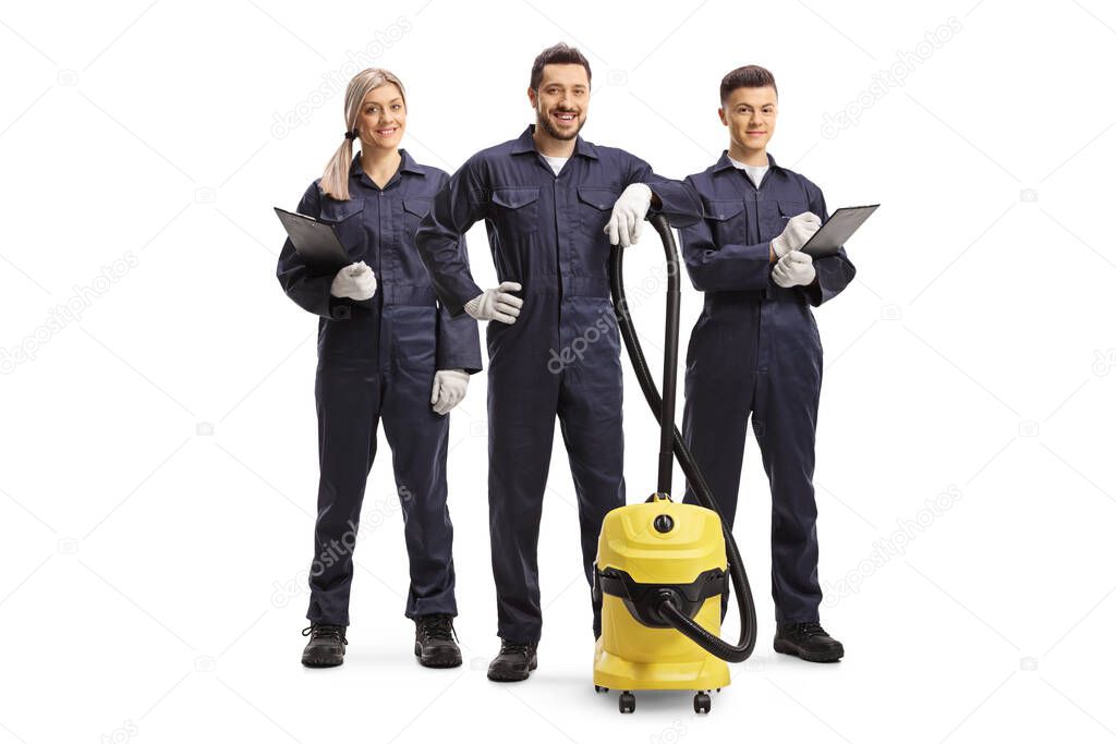 Team of cleaner workers with a professional hoover isolated on white background