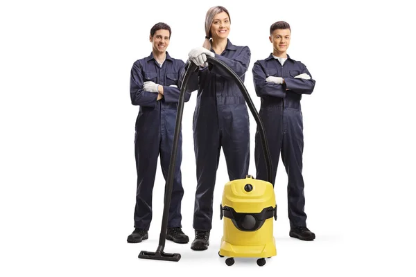 Full Length Portrait Team Cleaners Uniforms Vacuum Cleaner Isolated White — Stock Photo, Image