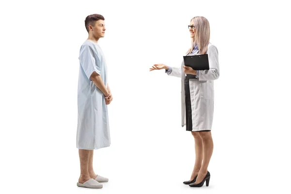 Full Length Profile Shot Female Doctor Young Male Patient Having — Stock Photo, Image