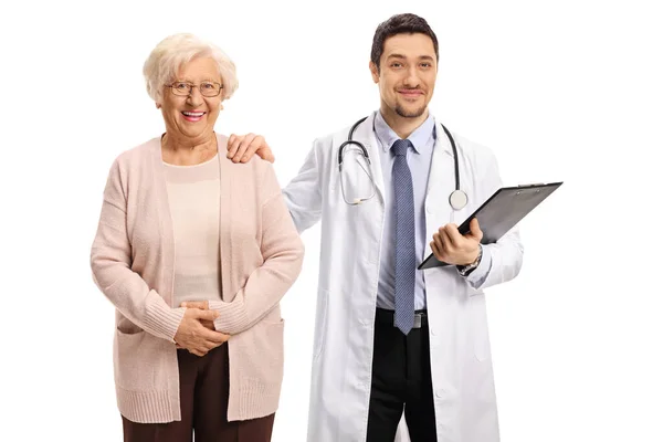 Young Male Doctor Holding Elderly Female Patient Shoulder Isolated White — Stock Photo, Image