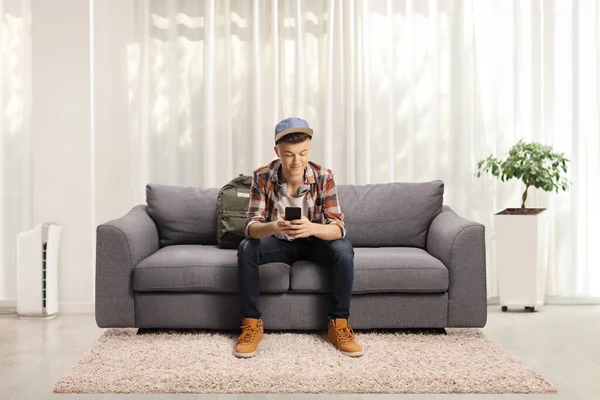 Male Student Sitting Sofa Headphones Apartment — Stock Photo, Image