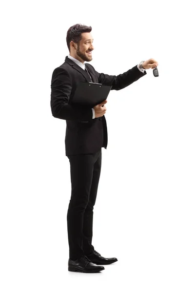 Full Length Profile Shot Businessman Giving Car Keys Isolated White — Stock Photo, Image