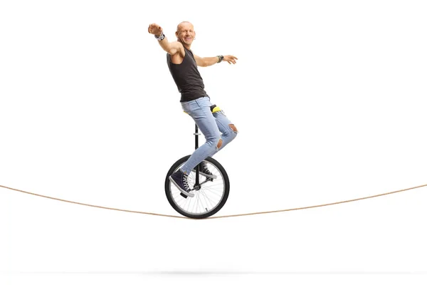 Hombre Calvo Hipster Equilibrando Monociclo Sobre Una Cuerda Aislada Sobre — Foto de Stock