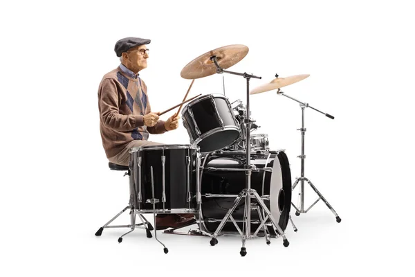 白人を背景に孤立したドラムセットを演奏する高齢者 — ストック写真