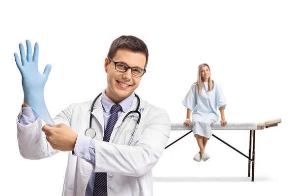 Médico Masculino Colocando Uma Luva Médica Uma Paciente Feminina Vestido — Fotografia de Stock