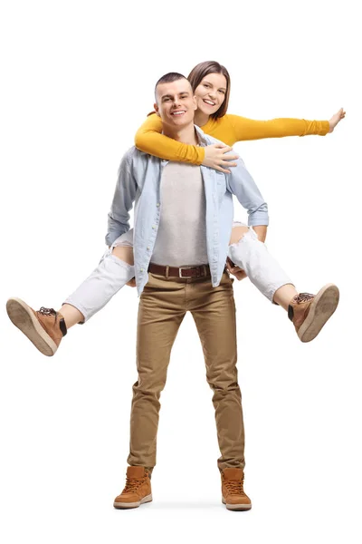 Cara Carregando Uma Jovem Alegre Feliz Costas Isolado Fundo Branco — Fotografia de Stock