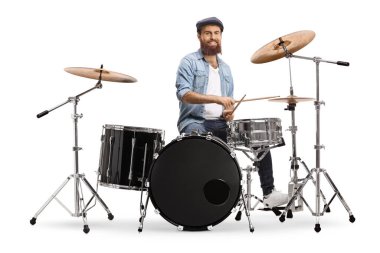Bearded musician playing a set of drums isolated on white background clipart