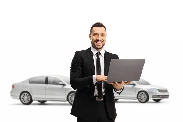 Man Suit Laptop Computer Smiling Camera Posing Front Cars Isolated — Stock Photo, Image