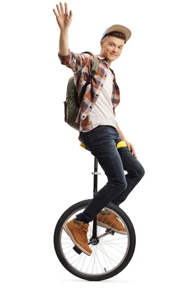 Young Male Student Balancing Unicycle Waving Isolated White Background — Stock Photo, Image