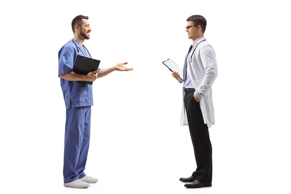 Full Length Profile Shot Doctor Male Nurse Talking Isolated White — Stock Photo, Image