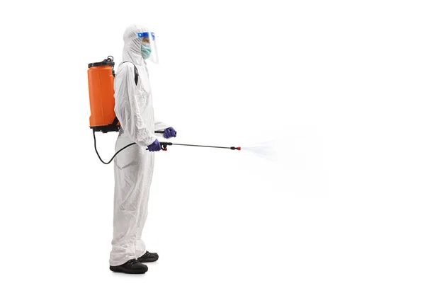 Full Length Profile Shot Man Hazmat Suit Carrying Disinfectant Bottle — Stock Photo, Image