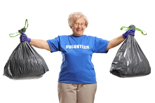 Madura Voluntaria Dama Posando Con Dos Bolsas Residuos Aislados Sobre —  Fotos de Stock