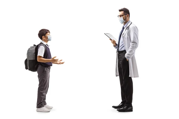 Full Length Profile Shot Schoolboy Talking Male Doctor Both Wearing — Stock Photo, Image