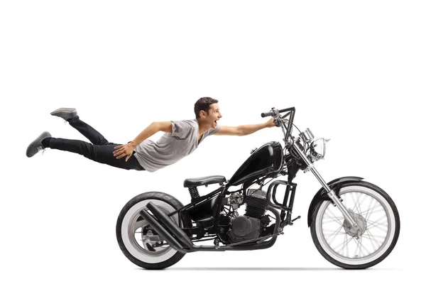 Young Man Flying Holding Chopper Motorbike Isolated White Background — Stock Photo, Image