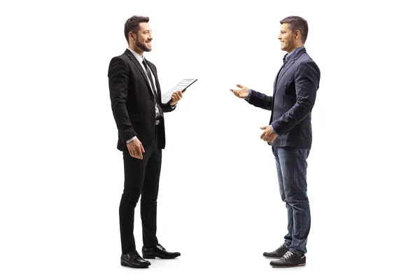 Full Length Profile Shot Two Male Colleagues Talking Isolated White — Stock Photo, Image
