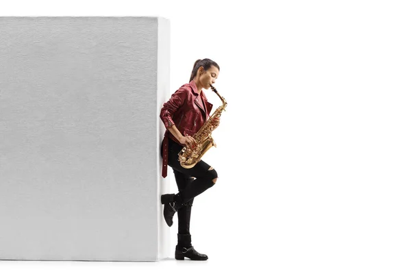 Full Length Profile Shot Young Woman Playing Saxophone Leaning Wall — Stock Photo, Image