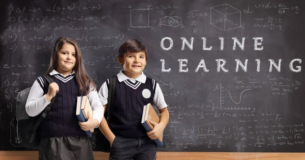 Schoolchildren Unifirm Books Backpacks Front Blackboard Text Online Learning — Stock Photo, Image