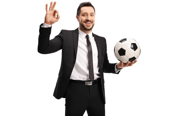 Man Black Suit Holding Soccer Ball Gesturing Sign Isolated White — Stock Photo, Image