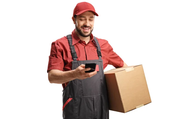 Male Worker Typing Mobile Phone Holding Cardboard Box Isolated White — Stock Photo, Image
