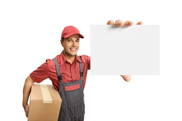 Smiling Male Courier Holding Cardboard Box Showing Blank Card Isolated — Stock Photo, Image