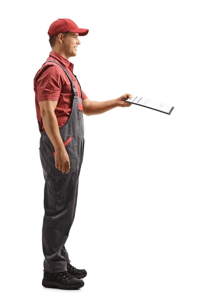 Full Length Profile Shot Male Courier Handing Document Clipboard Isolated — Stock Photo, Image