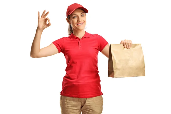 Yiyecek Teslimatçısı Kadın Elinde Çanta Beyaz Arka Planda Büyük Bir — Stok fotoğraf