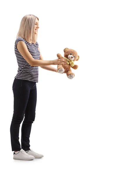 Full Length Profile Shot Young Blond Woman Giving Teddy Bear — Stock Photo, Image