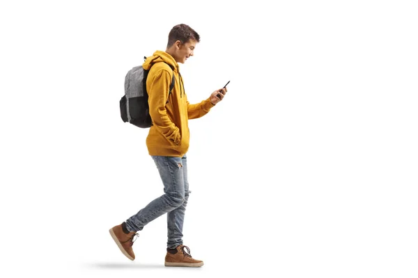 Full Length Profile Shot Male Teenage Student Walking Looking Mobile — Stock Photo, Image