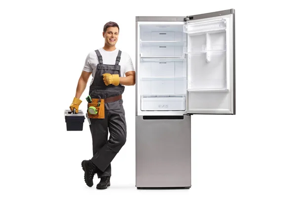 Full Length Portrait Repairman Tool Box Leaning Fridge Isolated White — Stock Photo, Image