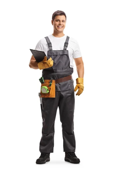 Full Length Portrait Male Worker Tool Belt Holding Clipboard Isolated — Stockfoto