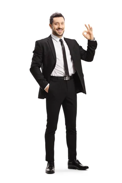 Full Length Portrait Young Man Wearing Black Suit Gesturing Sign — Stock Photo, Image