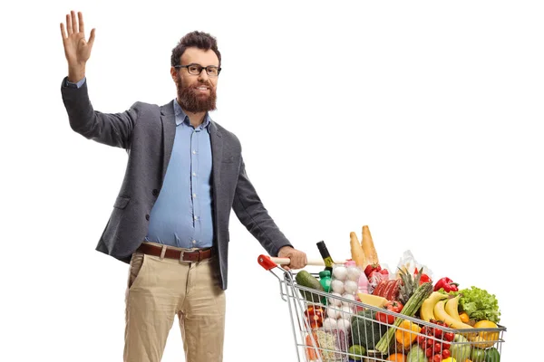 Sakallı Adam Elinde Alışveriş Arabasıyla Beyaz Arka Planda Sallanıyor — Stok fotoğraf