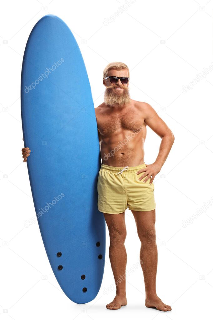 Full length portrait of a bearded young man with a surfboard isolated on white background